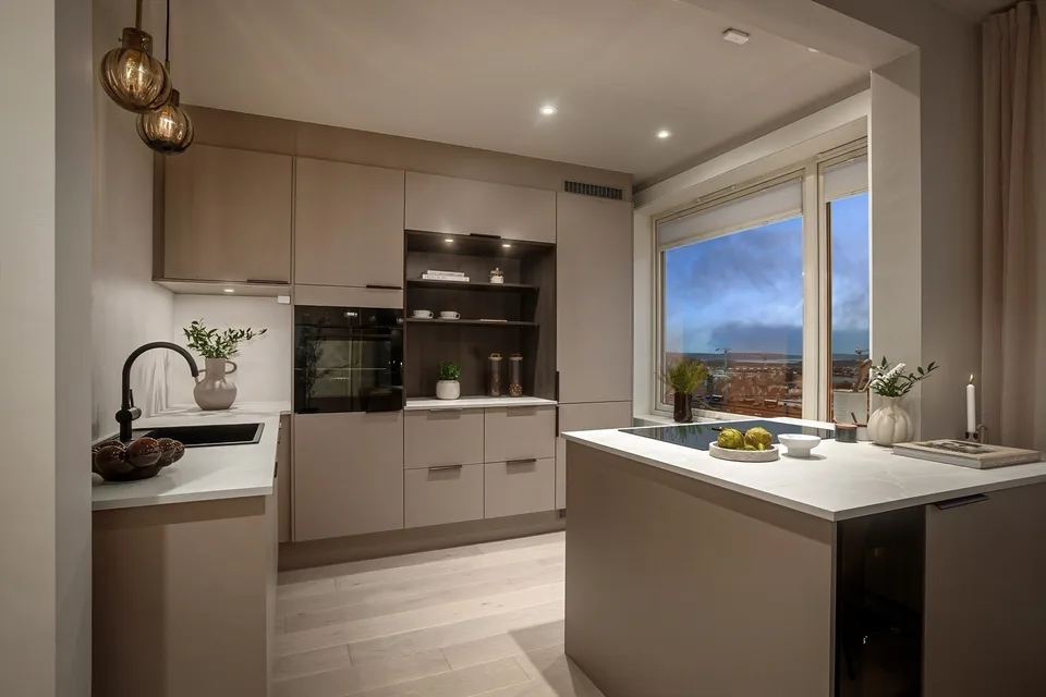 Completed Marienlyst kitchen with integrated appliances and an island